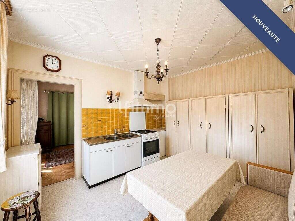 maison mitoyenne 4 pièces sur 8 ares de terrain - photo 2