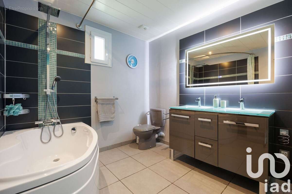 Photo 9 - Maison à SAINT-GENIS-LES-OLLIERES