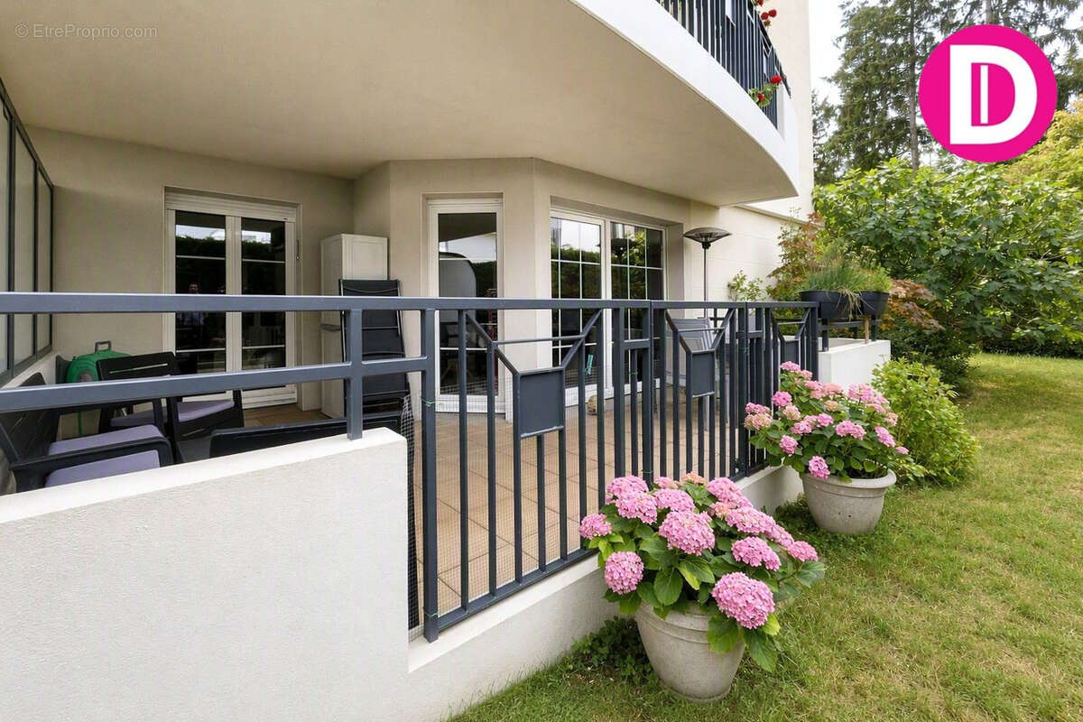 Appartement en rez-de-jardin avec garage, parking, cave, terrasse et jardin - photo 4