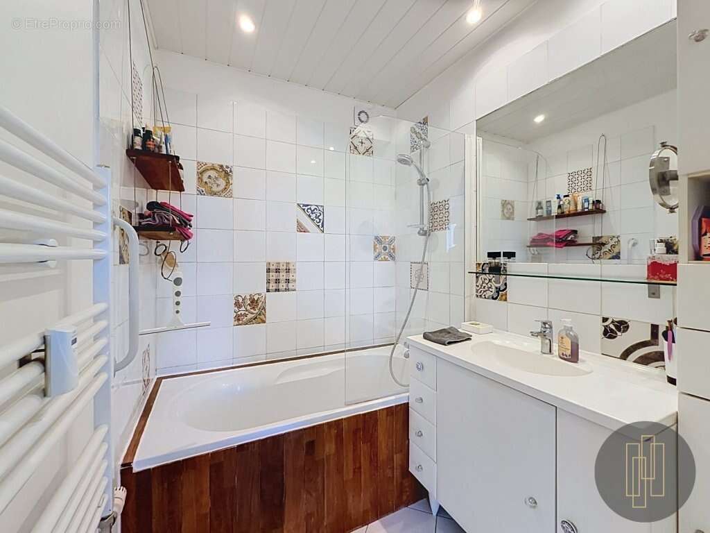 Exclusivité - Appartement 68.8 m², séjour double - 2 chambres - balcon cave et ascenseur - photo 6