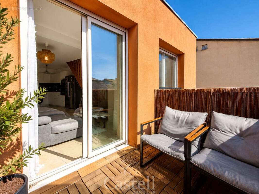 ***appartement duplex 4 pièces de 90 m² avec terrasse, 2 parkings et cellier  en plein cur de ville*** - photo 2