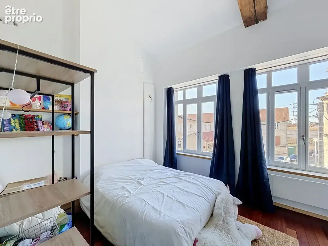 Au cœur du centre-ville d’Angoulême, superbe loft situé au 2ème étage d’un immeuble. - photo 7