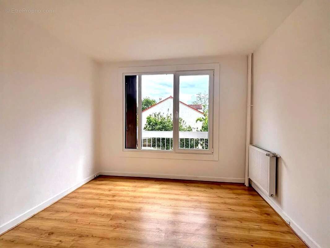 Élégant appartement familial de 80 m² entièrement rénové avec cave, stationnement et garage - photo 6