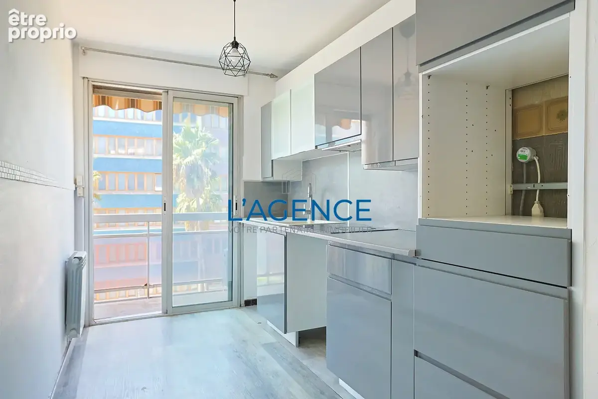 Appartement T4 de 91 m2 en étage avec ascenseur et parking privatif en plein coeur du centre ville - photo 5