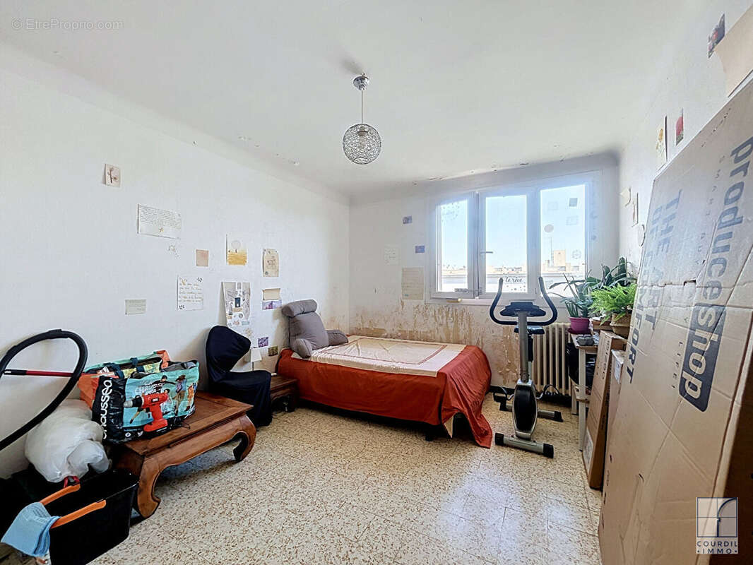 Nîmes 3 pièces vendu loué 65,90 m² cave et parking - photo 4