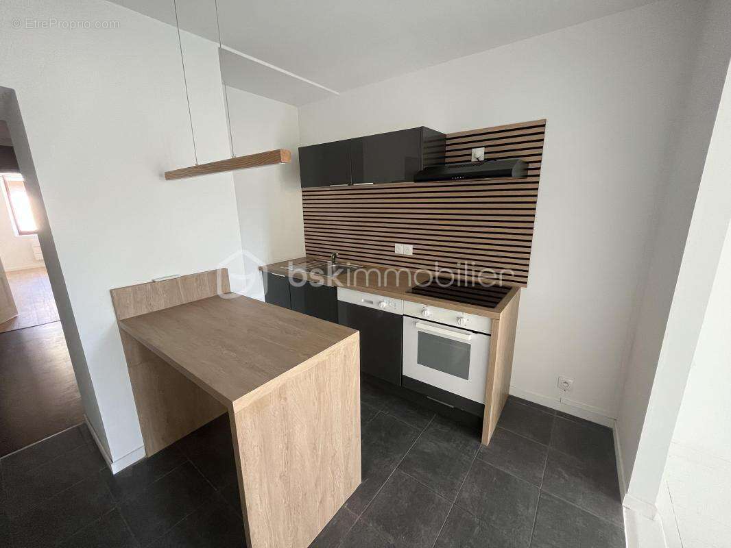 Appartement T2  de 55 m² avec grand balcon et cave - photo 4