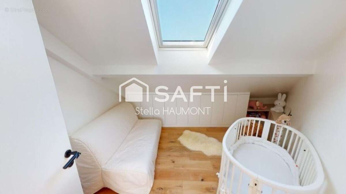 Photo 9 - Appartement à COURBEVOIE