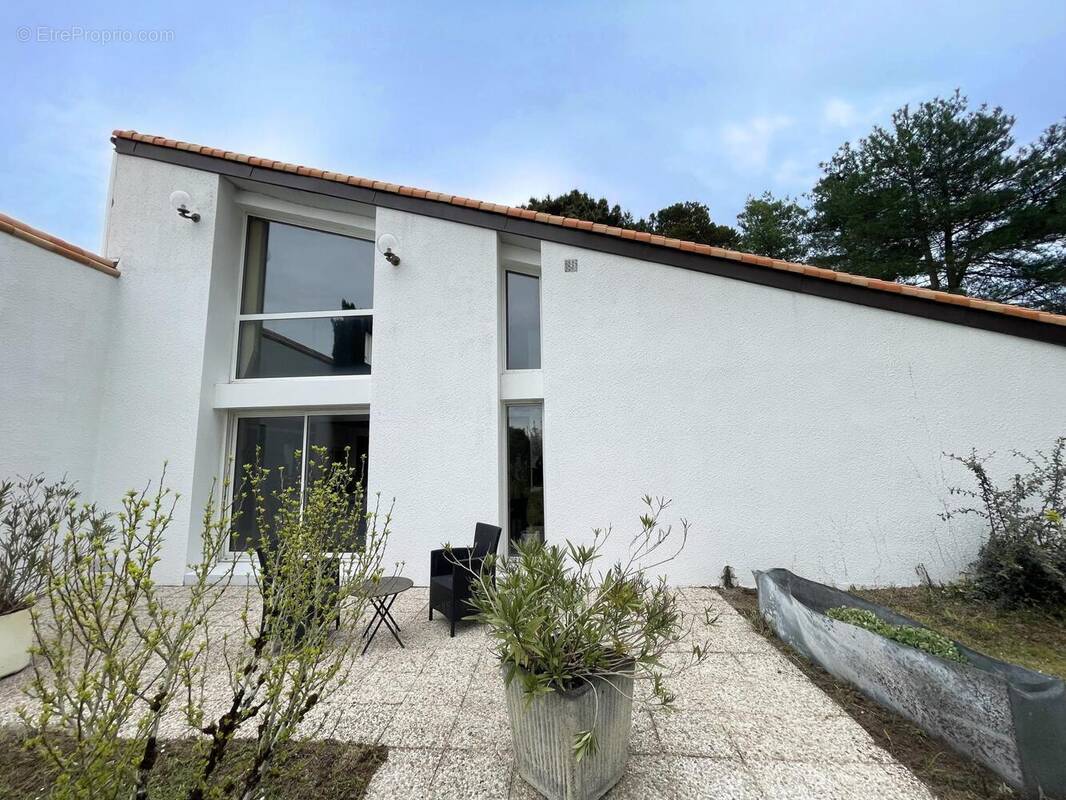 Photo 1 - Maison à BOUGUENAIS
