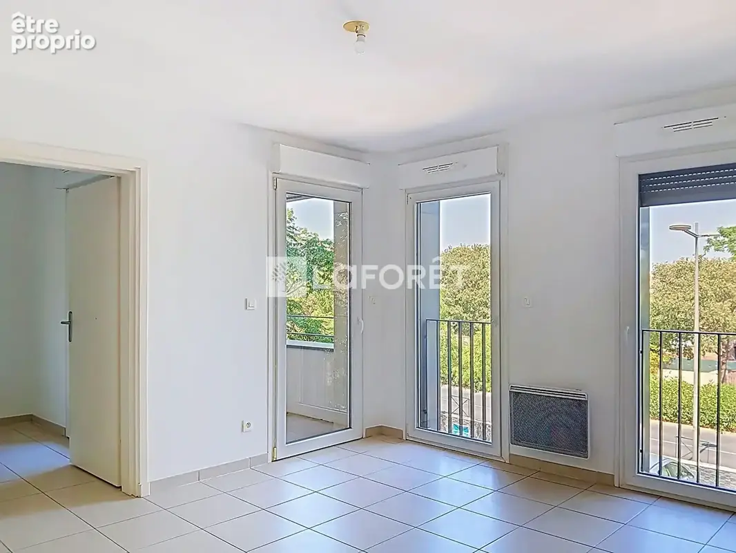 Appartement Juvignac 3 pièce(s) 55 m2 double box électrifié en sous sol - photo 3