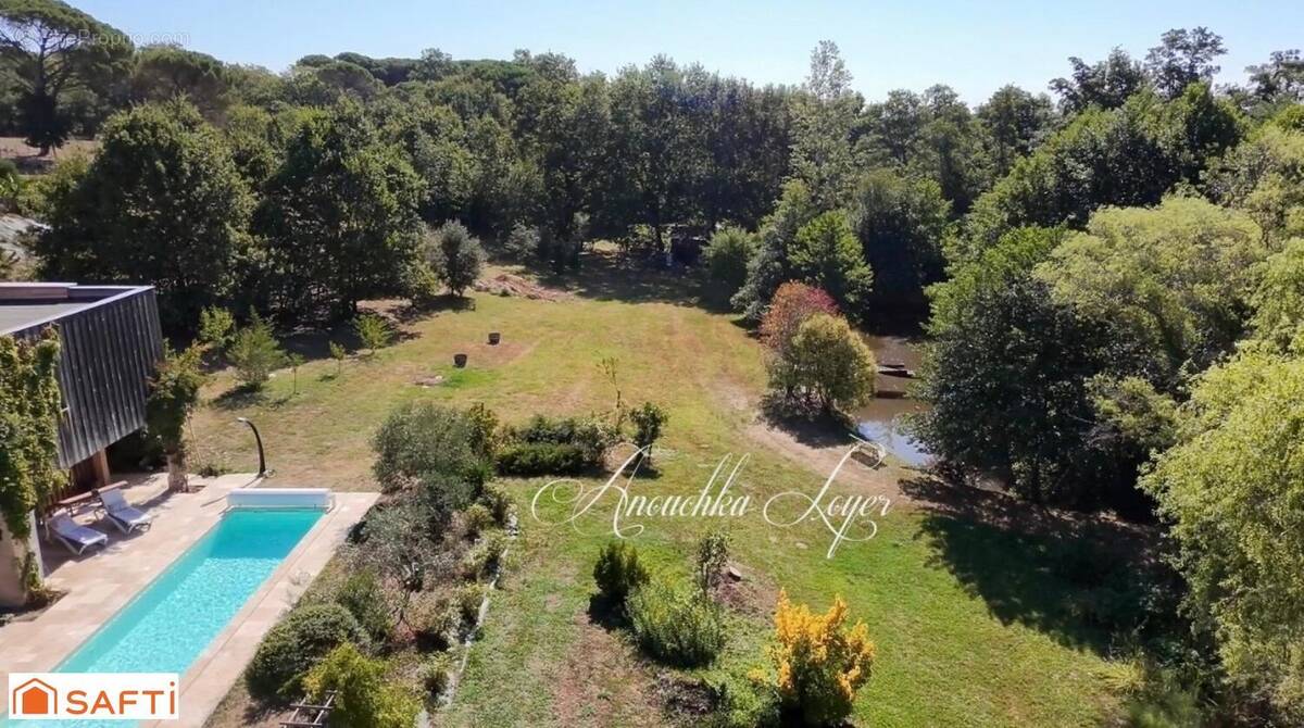 Photo 1 - Maison à ROAILLAN