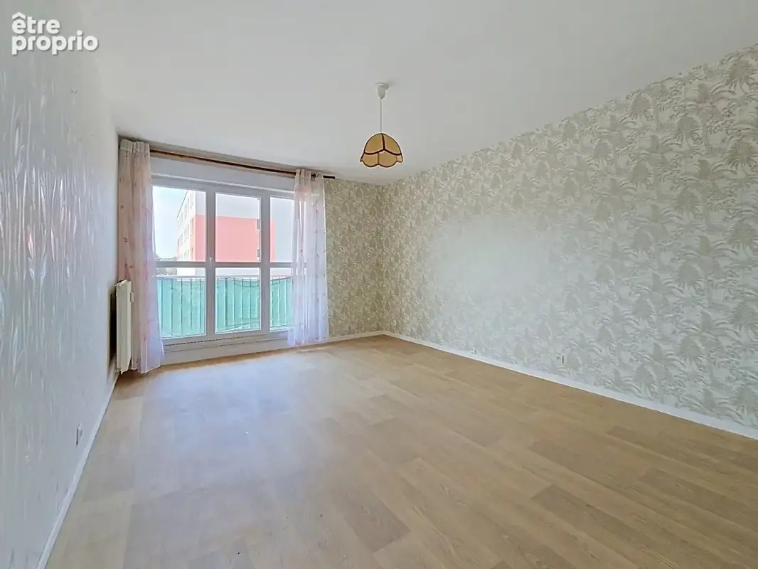Appartement F4 avec balcon, parking et cave - photo 2
