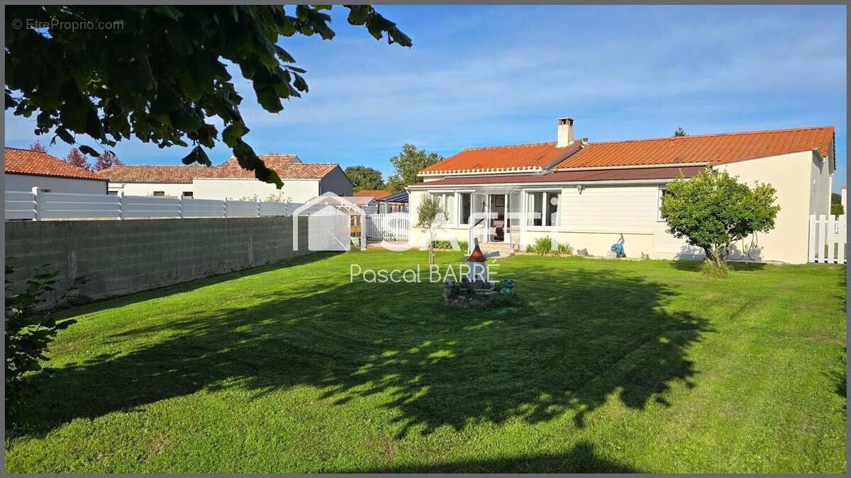 Photo 2 - Maison à SAINT-JULIEN-DES-LANDES