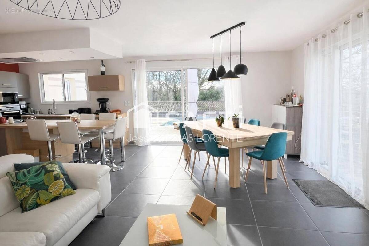 Photo 1 - Maison à FARGUES-SAINT-HILAIRE