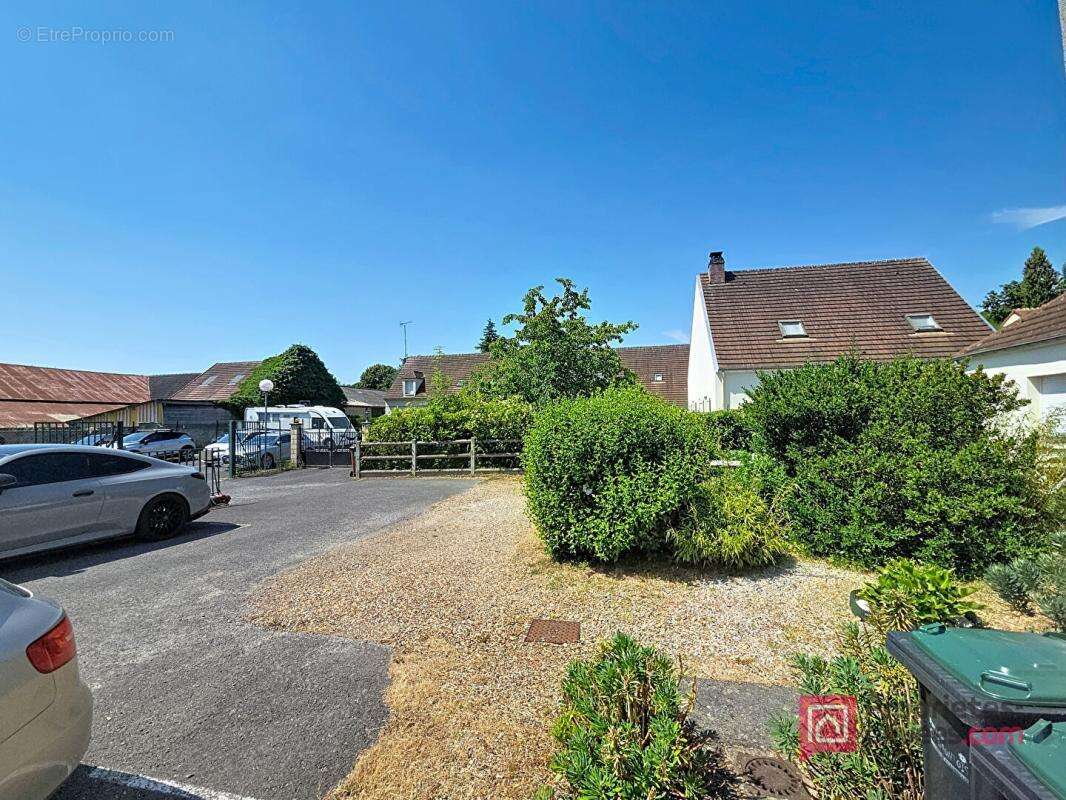 Appartement en rez-de-chaussée avec cour et 2 stationnements - photo 10