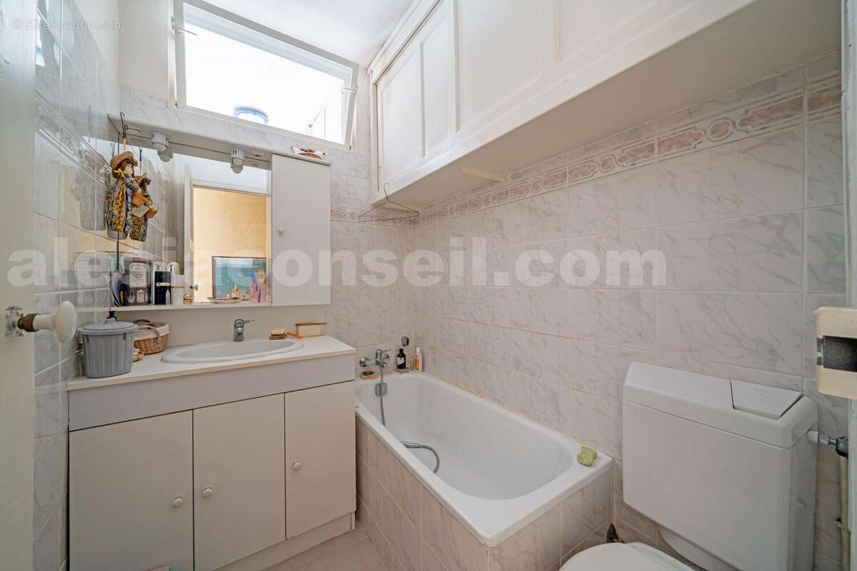 Photo n°2 - Appartement à PARIS-14E