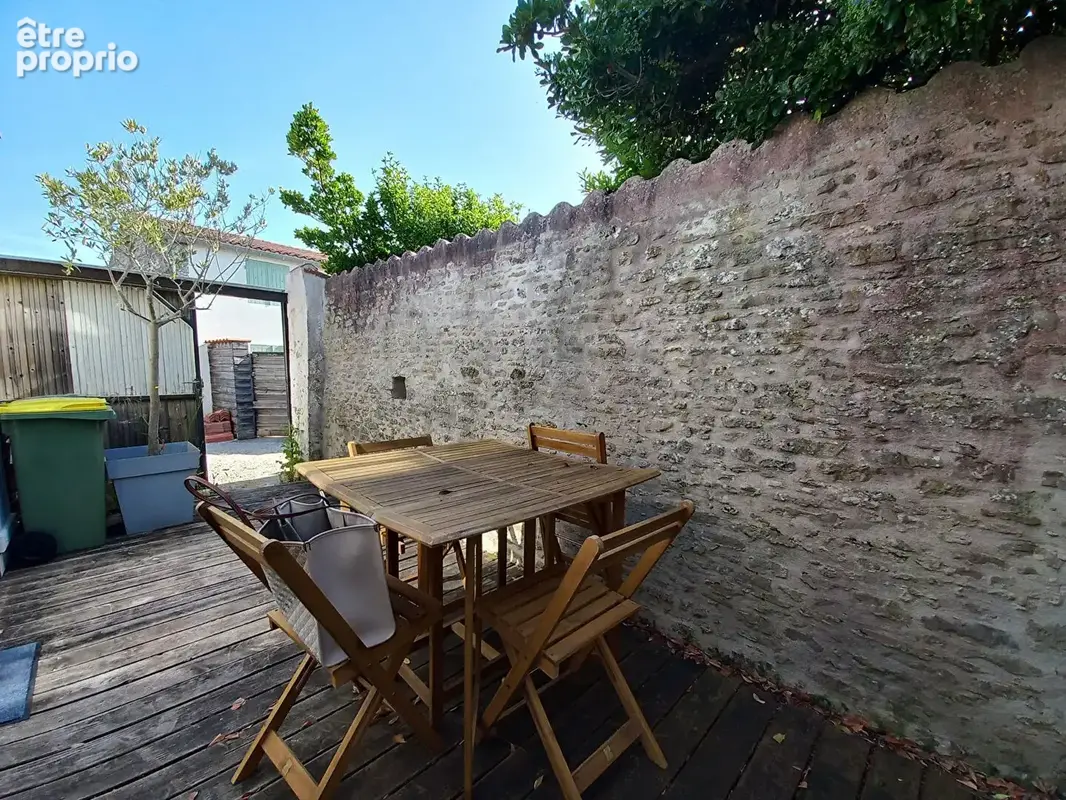 Ancien chai rénové de 57 m² avec patio : charme et authenticité ! - photo 5