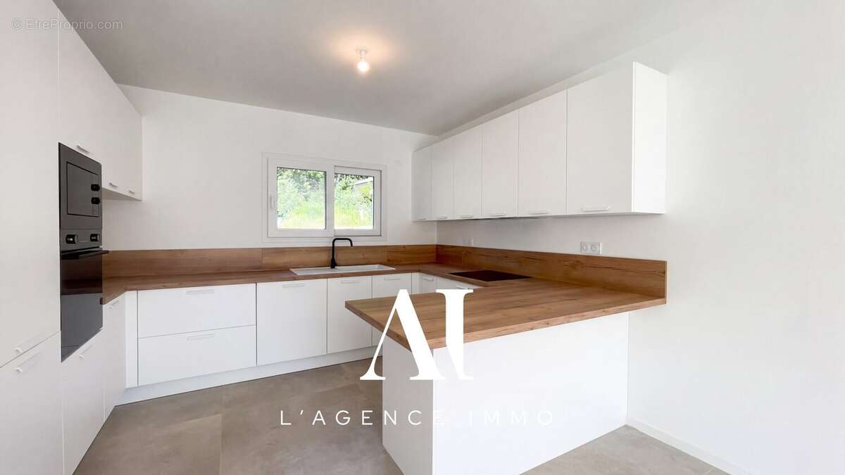 Maison 169 m² à Echenevex  - photo 6