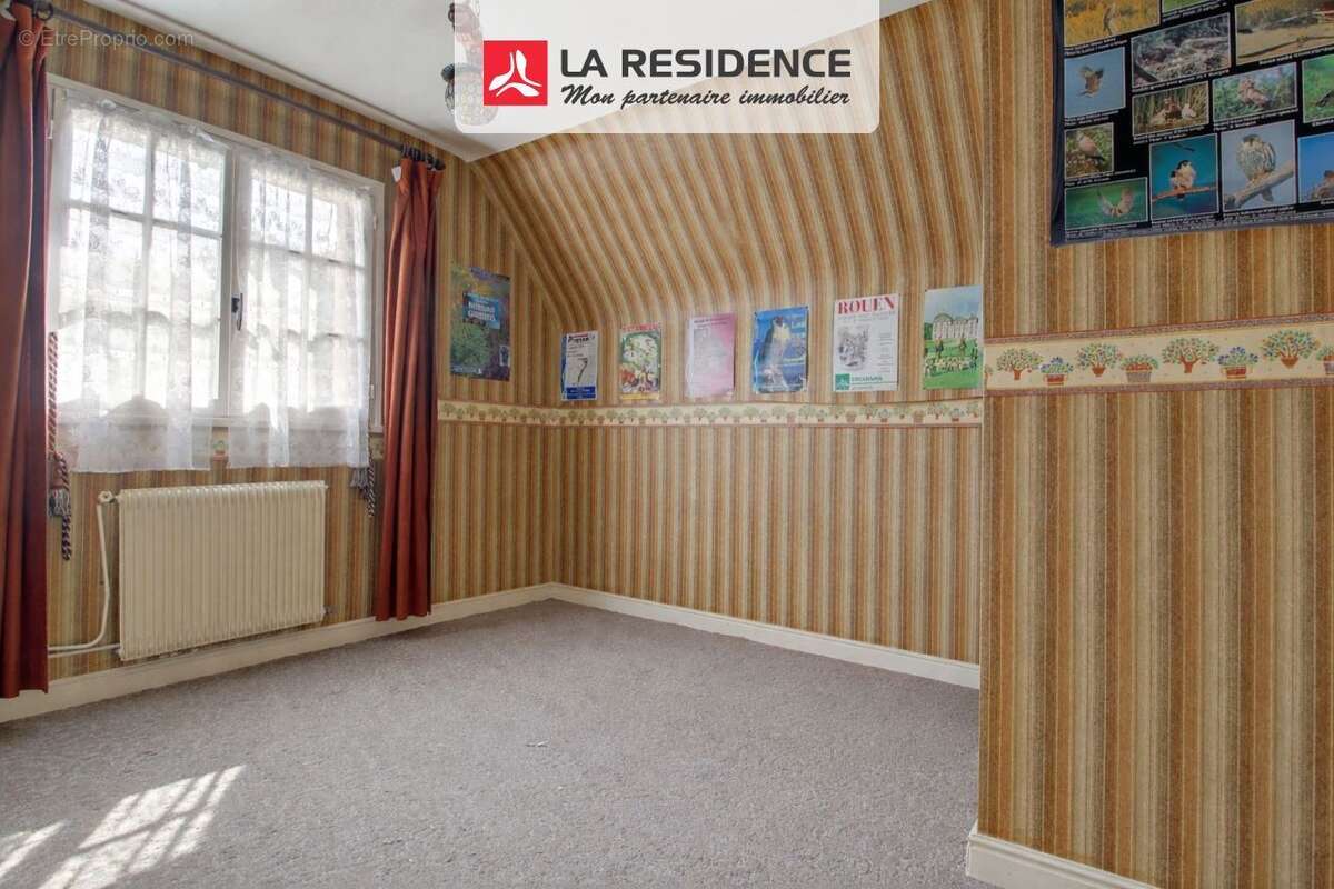 Maison 125 m² à Saint-Etienne-Du-Rouvray  - photo 8