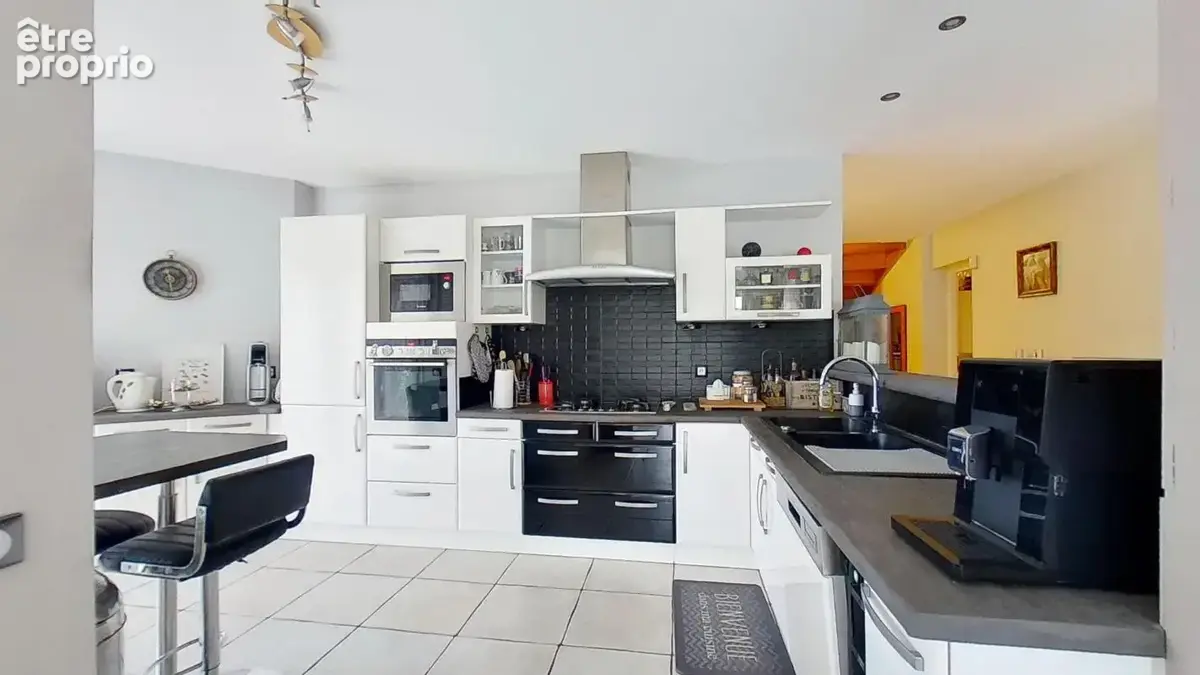 Maison 5 pièces 141 m² à vendre à Bron (69500) - photo 7