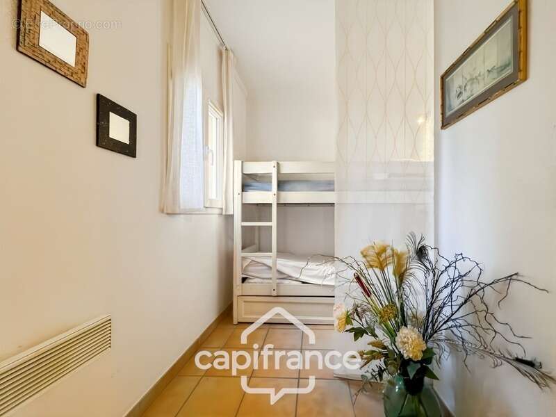 appartement REZ de JARDIN,résidence du lac, 31 m2, chambre ouverte, grande salle de douche, rangements, cave collective - photo 23