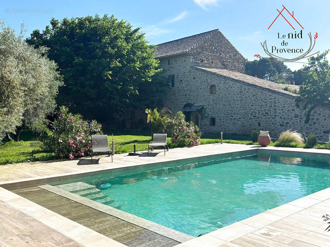 Maison à LAUDUN-L'ARDOISE