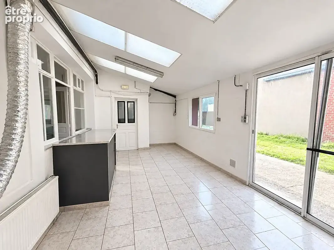 LAPUGNOY - Immeuble mixte commerce et habitation - photo 3