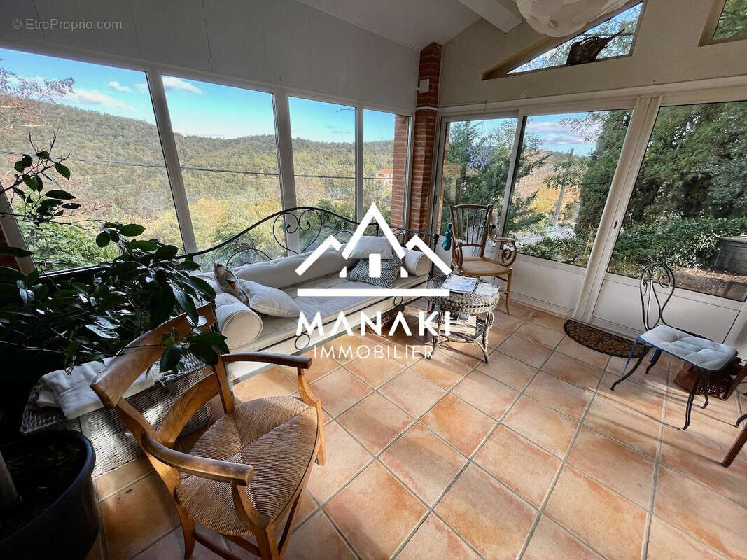 Véranda - Maison à OMS