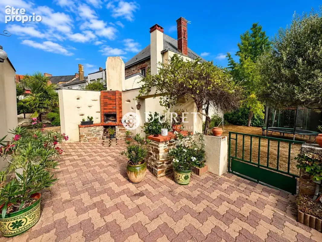 TERRASSE AVEC COIN BARBECUE