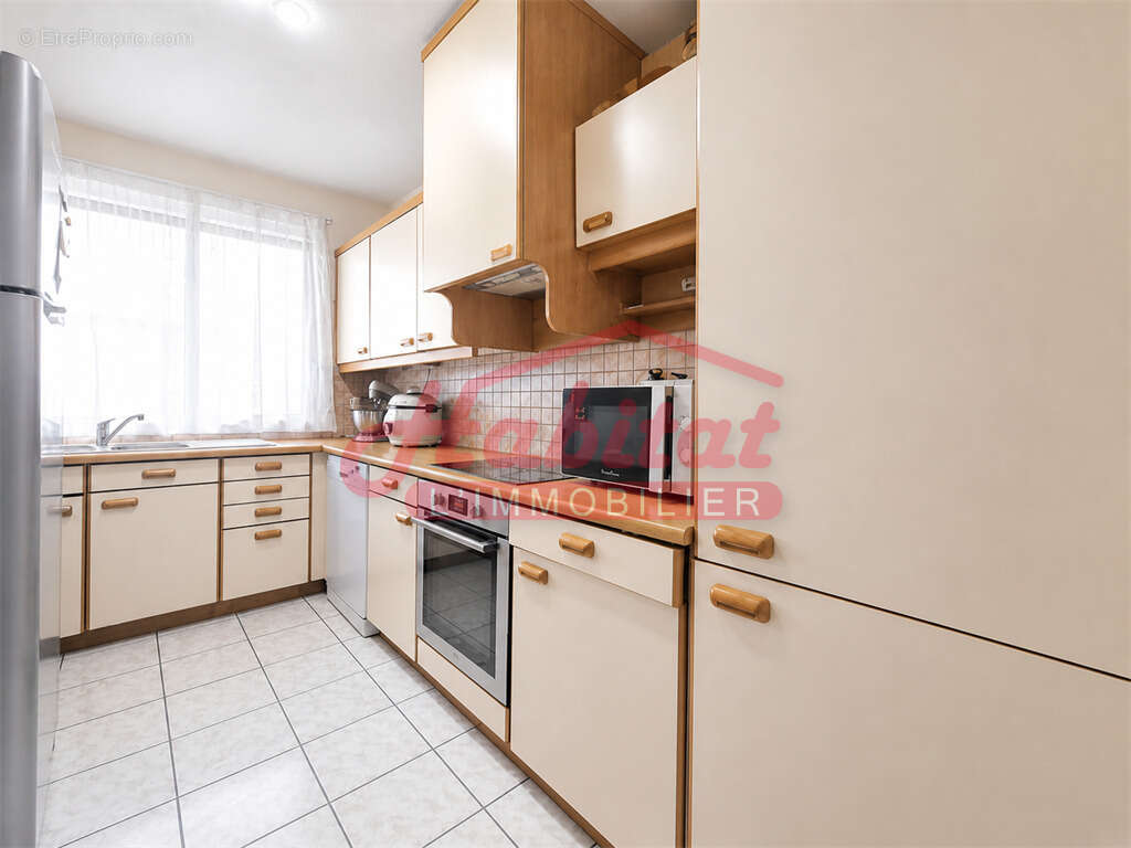 Chelles centre-ville : appartement + box - photo 3