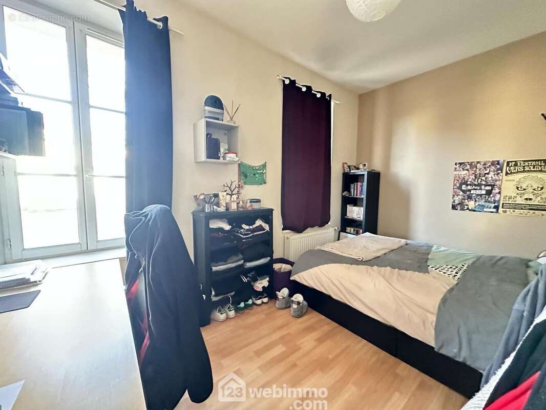 La deuxième chambre de 11 m² - Appartement à LAON