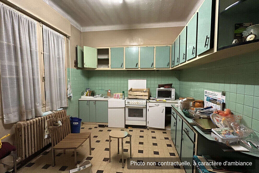 Maison de 217 m² à vendre en coeur de ville avec 2 appartements indépendants, terrain de 575 m² et fort potentiel d'aménagement - photo 2