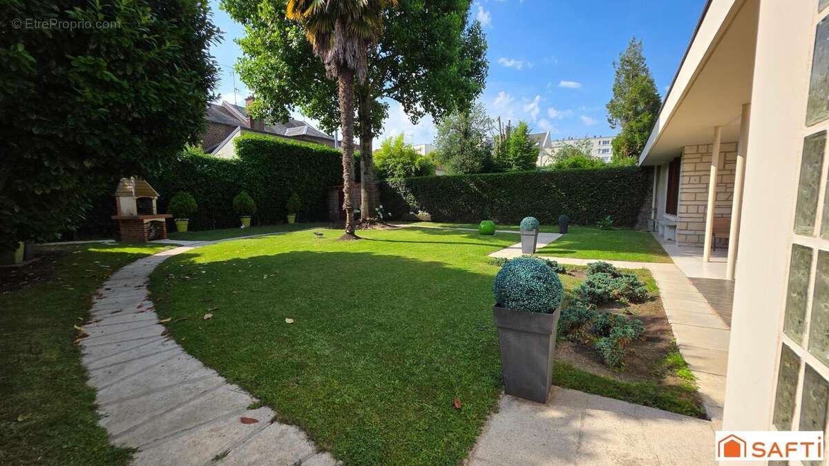 Photo 4 - Maison à SAINT-QUENTIN