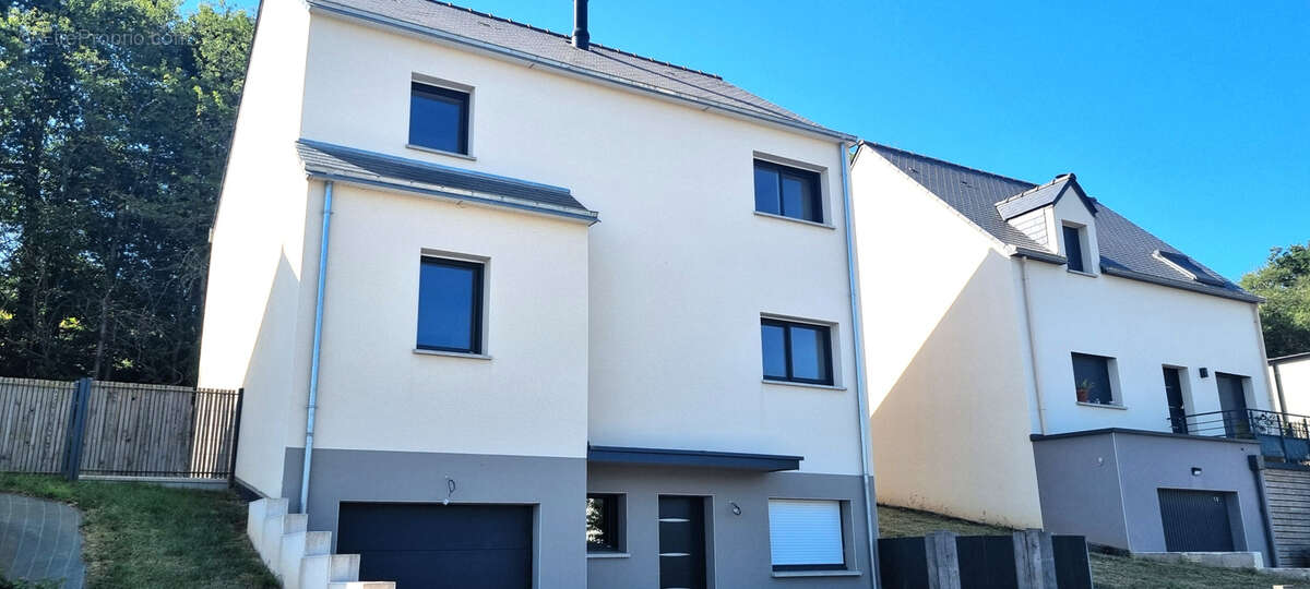 Belle maison neuve dans un cadre verdoyant - photo 14