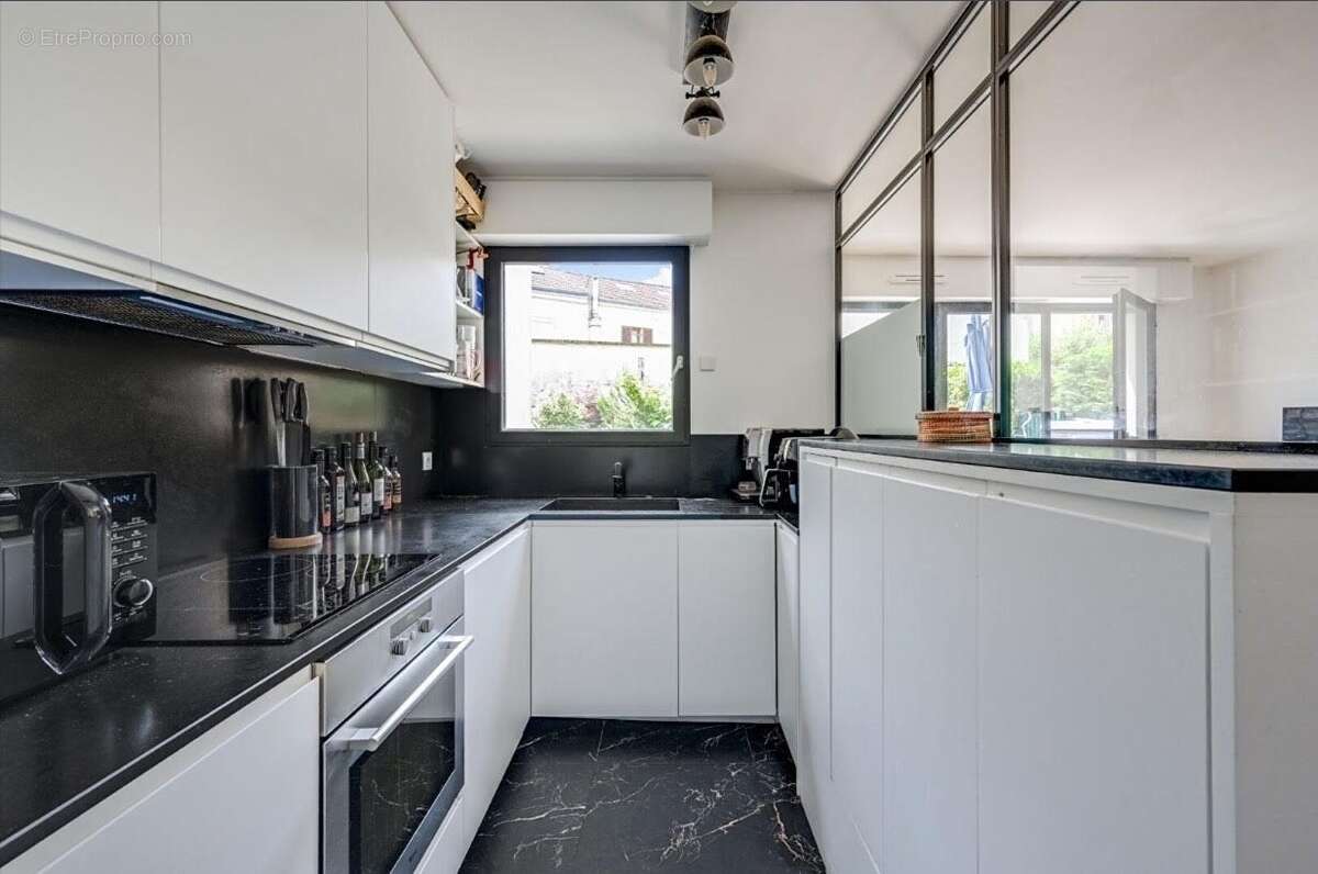 Appartement 60 m² à Asnieres-Sur-Seine  - photo 7