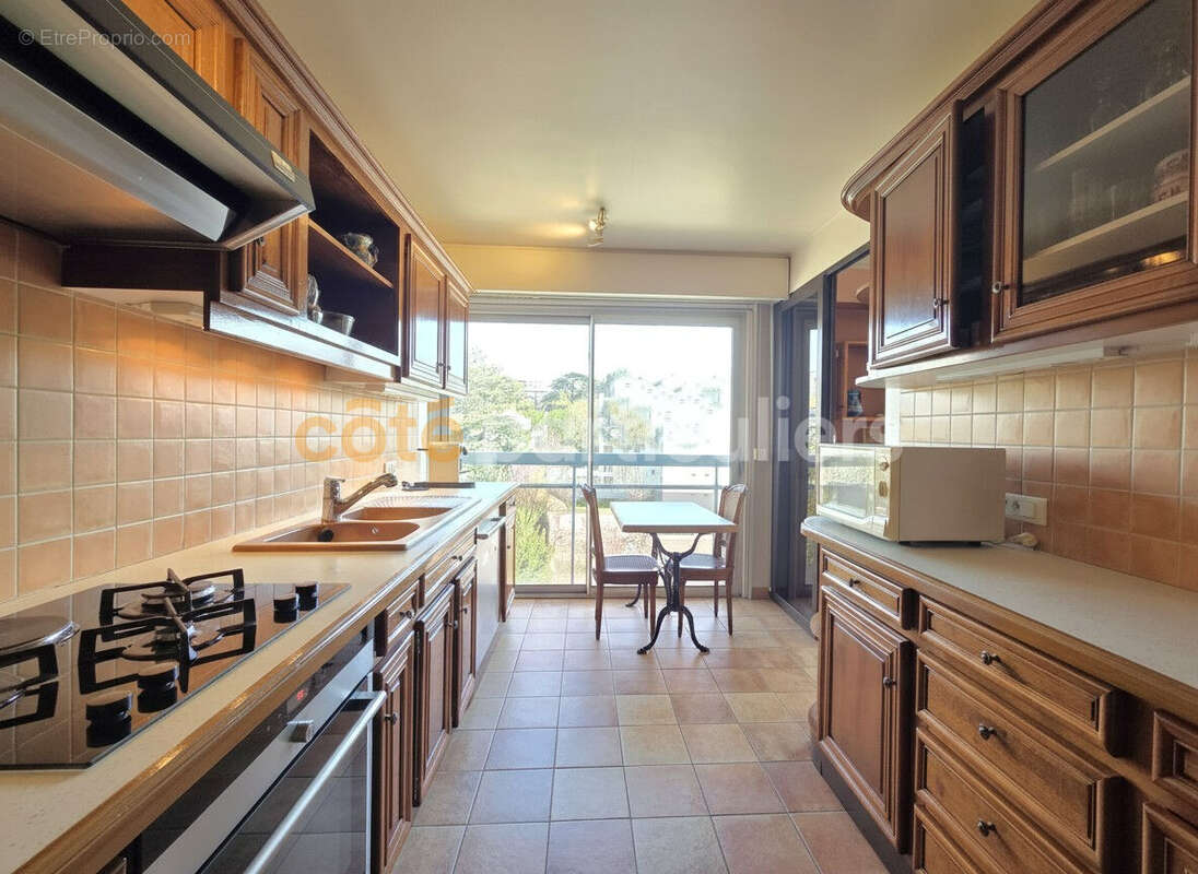 Appartement Saint Germain En Laye 5 pièce(s) 94 m2 - Balcon - Double Box - photo 2
