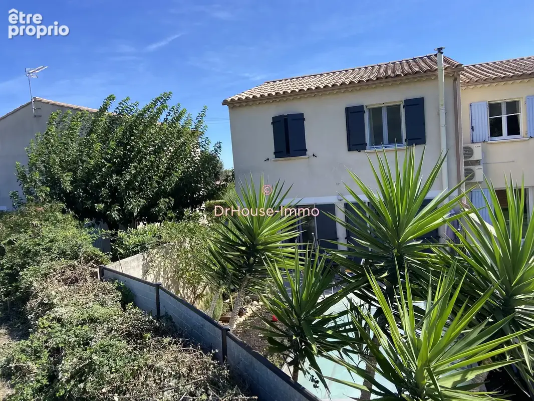 Maison à LAUDUN-L'ARDOISE