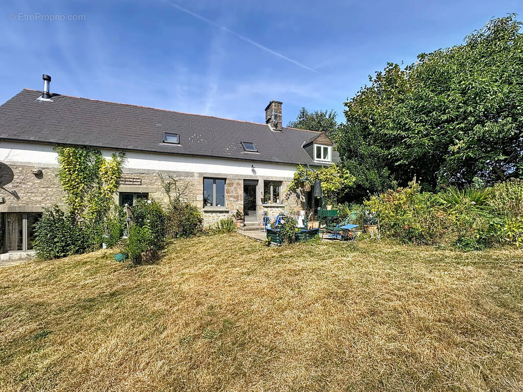 Maison à JUVIGNY-LE-TERTRE