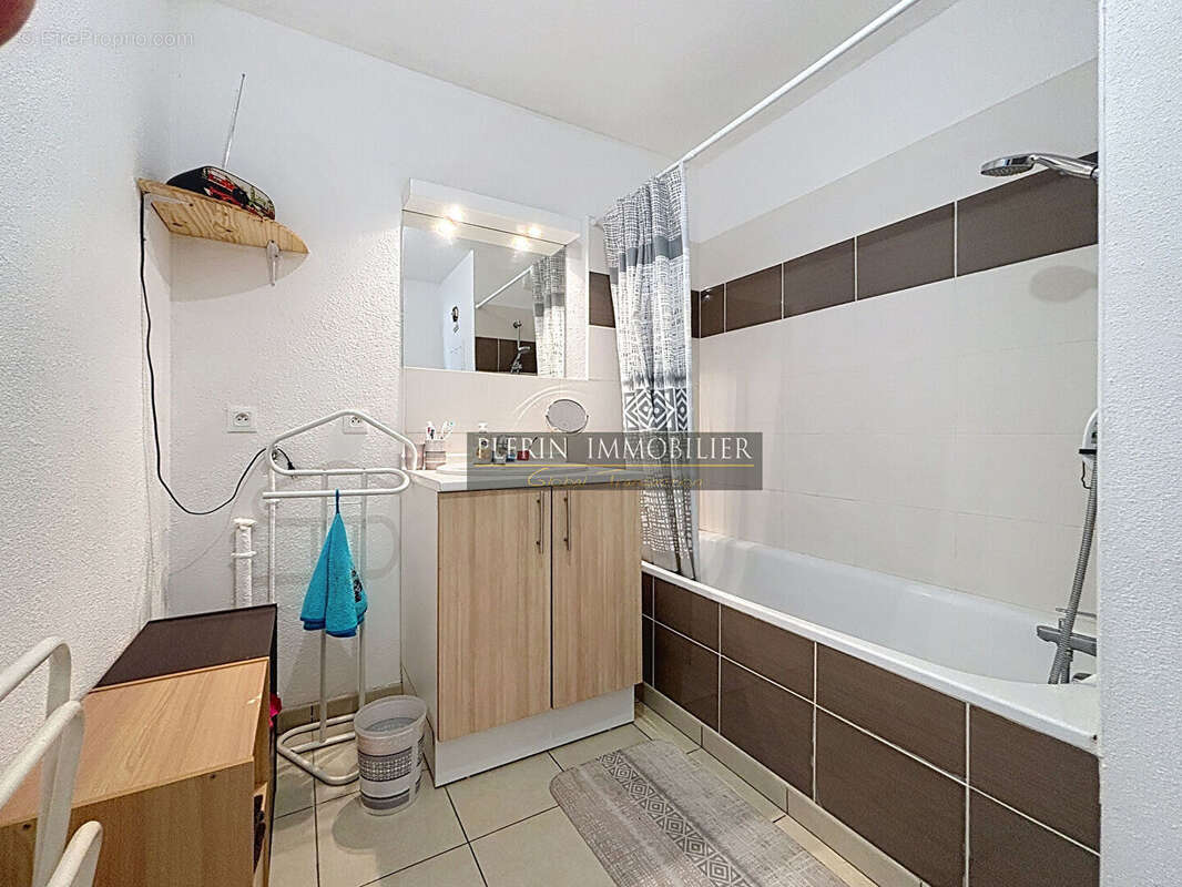 T2- immeuble récent - photo 5