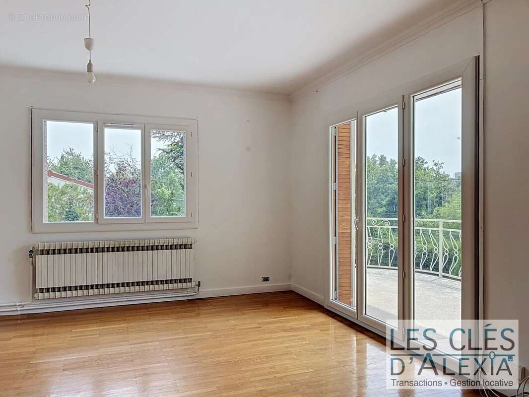 Maison deux appartements- Terrain- deux garages- Veranda - photo 8