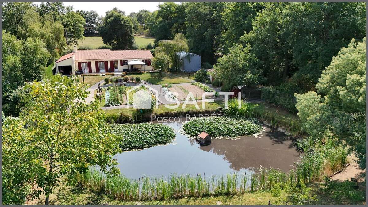 Photo 2 - Maison à SAINT-JULIEN-DES-LANDES