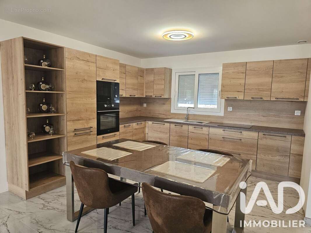 Maison 108 m² à Asnieres-La-Giraud  - photo 2