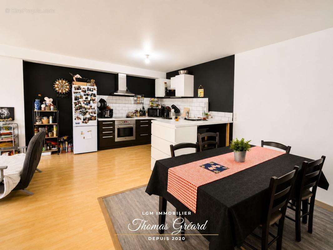  Immeuble mixte avec murs commerciaux, appartement, annexe et grange – Rentabilité nette de 8,2 % - photo 4