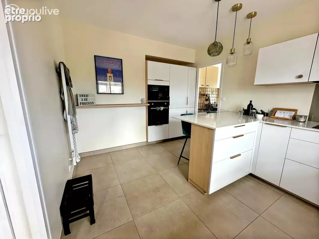 Maison plain-pied 103 m² – 3 chambres – jardin – véranda – grand garage - photo 5