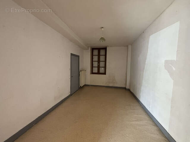 EXCLUSIVITE à AUTUN, T3 en RDC avec balcon et garage. - photo 3