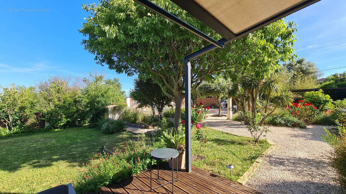 vue de la terrasse couverte - Maison à TOURBES