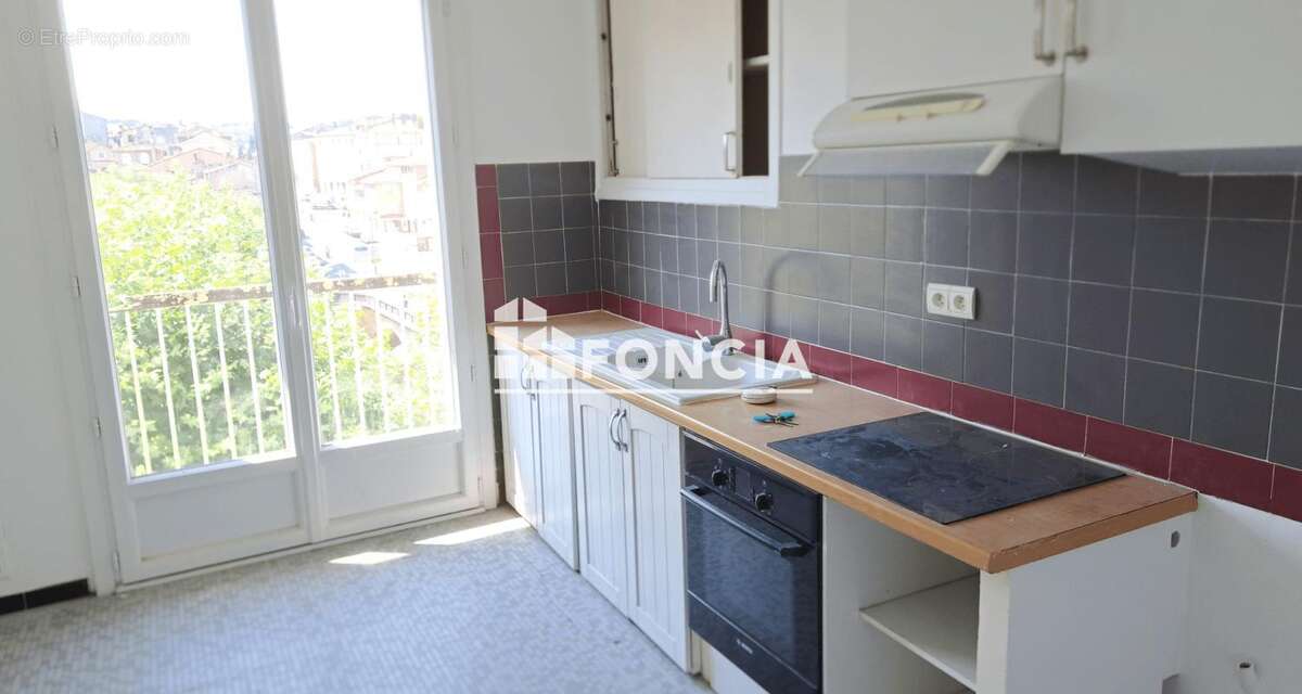 Centre ville - appartement renove - photo 4