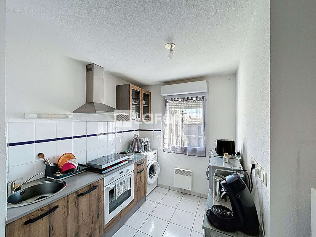 À vendre - Appartement T2 48 m² (loi Carrez) loué dans une résidence sécurisée - photo 2