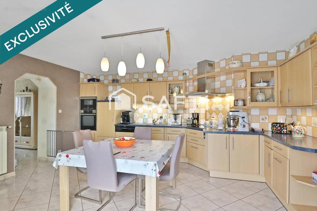 Photo 1 - Maison à AUDUN-LE-ROMAN