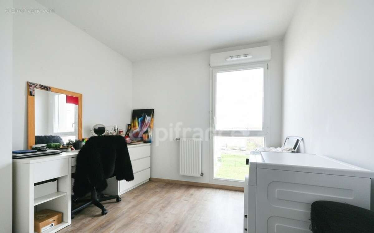 Appartement T3 en résidence sécurisée - photo 6