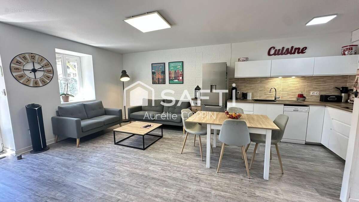 Photo 3 - Appartement à SAINT-ROMAIN-DE-JALIONAS